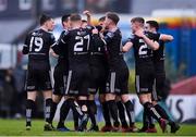 14 June 2019; Daniel Mandroiu, hidden, of Bohemians celebrates after scoring his side's first goal, from a penalty, with team-mates during the SSE Airtricity League Premier Division match between Bohemians and Shamrock Rovers at Dalymount Park in Dublin. Photo by Ben McShane/Sportsfile