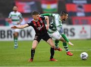 14 June 2019; Jack Byrne of Shamrock Rovers in action against Paddy Kirk of Bohemians during the SSE Airtricity League Premier Division match between Bohemians and Shamrock Rovers at Dalymount Park in Dublin. Photo by Seb Daly/Sportsfile