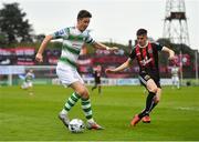 14 June 2019; Ronan Finn of Shamrock Rovers in action against Paddy Kirk of Bohemians during the SSE Airtricity League Premier Division match between Bohemians and Shamrock Rovers at Dalymount Park in Dublin. Photo by Seb Daly/Sportsfile