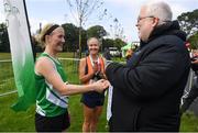 15 June 2019; Chair of Competitions John Cronin presents Sally Forristal of St. Joseph's A.C., Co. Kilkenny, with her winners medal following the Irish Runner 5 Mile in conjunction with the AAI National 5 Mile Championships at the Phoenix Park in Dublin. Photo by Harry Murphy/Sportsfile