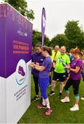 15 June 2019; parkrun participants are pictured scanning their barcodes to receive a prize following the Griffeen parkrun where Vhi hosted a special Roadshow event to celebrate their partnership with parkrun Ireland. Vhi ambassador and Olympian David Gillick was on hand to lead the warm up for parkrun participants before completing the 5km free event. Parkrunners enjoyed refreshments post event at the Vhi Rehydrate, Relax, Refuel and Reward areas where a physiotherapist took participants through a post event stretching routine. Parkrun in partnership with Vhi support local communities in organising free, weekly, timed 5k runs every Saturday at 9.30am. To register for a parkrun near you visit www.parkrun.ie.  Photo by Seb Daly/Sportsfile
