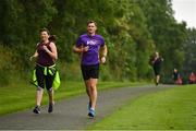 15 June 2019; parkrun participant Lorraine Horgan, from Lucan, Dublin, is pictured alongside Vhi ambassador and Olympian David Gillick at the Griffeen parkrun where Vhi hosted a special Roadshow event to celebrate their partnership with parkrun Ireland. Vhi ambassador and Olympian David Gillick was on hand to lead the warm up for parkrun participants before completing the 5km free event. Parkrunners enjoyed refreshments post event at the Vhi Rehydrate, Relax, Refuel and Reward areas where a physiotherapist took participants through a post event stretching routine. Parkrun in partnership with Vhi support local communities in organising free, weekly, timed 5k runs every Saturday at 9.30am. To register for a parkrun near you visit www.parkrun.ie.  Photo by Seb Daly/Sportsfile