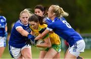 15 June 2019; Katy Herron of Donegal in action against Laura Fitzpatrick and Sinead O'Sullivan of Cavan during the TG4 Ladies Football Ulster Senior Football Championship semi-final match between Cavan and Donegal at Killyclogher in Tyrone. Photo by Oliver McVeigh/Sportsfile