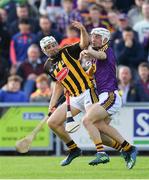 15 June 2019; Pádraig Walsh of Kilkenny is tackled by Cathal Dunbar of Wexford during the Leinster GAA Hurling Senior Championship Round 5 match between Wexford and Kilkenny at Innovate Wexford Park in Wexford. Photo by Piaras Ó Mídheach/Sportsfile