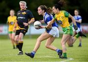 15 June 2019; Neasa Byrd of Cavan in action against Anna Marie McGlynn of Donegal during the TG4 Ladies Football Ulster Senior Football Championship semi-final match between Cavan and Donegal at Killyclogher in Tyrone. Photo by Oliver McVeigh/Sportsfile