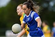 15 June 2019; Aishling Sheridan of Cavan in action against Evelyn McGinley of Donegal during the TG4 Ladies Football Ulster Senior Football Championship semi-final match between Cavan and Donegal at Killyclogher in Tyrone. Photo by Oliver McVeigh/Sportsfile
