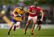 16 June 2019; Diarmuid Cahill of Clare in action against Cian McCarthy of Cork during the Electric Ireland Munster Minor Hurling Championship match between Clare and Cork at Cusack Park in Ennis, Clare. Photo by Eóin Noonan/Sportsfile