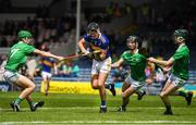 16 June 2019; Stephen Ferncombe of Tipperary in action against Adam Murrihy, Ronan Lyons and Fergal O'Connor, right, of Limerick during the Electric Ireland Munster GAA Minor Hurling Championship Round 5 match between Tipperary and Limerick in Semple Stadium, Thurles, in Tipperary. Photo by Ray McManus/Sportsfile