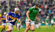 16 June 2019; Aidan O'Connor of Limerick in action against Jamie Duncan of Tipperary  during the Electric Ireland Munster GAA Minor Hurling Championship Round 5 match between Tipperary and Limerick in Semple Stadium, Thurles, in Tipperary. Photo by Ray McManus/Sportsfile
