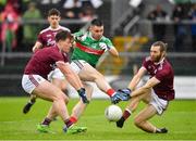 16 June 2019; Keith Hopkins of Mayo in action against Adrian Ward, left, and Daniel O'Ruairc of Galway during the Connacht GAA Football Junior Championship Final match between Galway and Mayo at Pearse Stadium in Galway. Photo by Seb Daly/Sportsfile