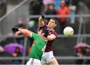 16 June 2019; Sean Denvir of Galway in action against Barry Leonard of Mayo during the Connacht GAA Football Junior Championship Final match between Galway and Mayo at Pearse Stadium in Galway. Photo by Seb Daly/Sportsfile