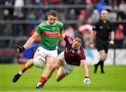 16 June 2019; Conor Igoe of Mayo in action against Padraic Éoin Ó Currin of Galway during the Connacht GAA Football Junior Championship Final match between Galway and Mayo at Pearse Stadium in Galway. Photo by Seb Daly/Sportsfile