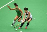 16 June 2019; Jang Heesun of Korea in action against Anna O'Flanagan of Ireland during the FIH World Hockey Series Final match between Ireland and Korea at Banbridge Hockey Club in Banbridge, Down.  Photo by Oliver McVeigh/Sportsfile