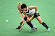 16 June 2019; Hannah Matthews of Ireland in action against Lee Seungju of Korea during the FIH World Hockey Series Final match between Ireland and Korea at Banbridge Hockey Club in Banbridge, Down.  Photo by Oliver McVeigh/Sportsfile