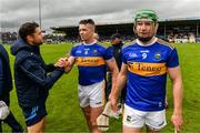 16 June 2019; Tipperary Strength and Conditioning Coach Cairbre Ó Cairealláin with Padraic Maher and Noel McGrath of Tipperary after the Munster GAA Hurling Senior Championship Round 5 match between Tipperary and Limerick in Semple Stadium in Thurles, Co. Tipperary. Photo by Diarmuid Greene/Sportsfile