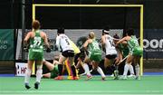 16 June 2019; Nicola Daly of Ireland, (falling on the left) scrambles a goal near the end of the FIH World Hockey Series Final match between Ireland and Korea at Banbridge Hockey Club in Banbridge, Down.  Photo by Oliver McVeigh/Sportsfile