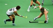 16 June 2019; Cho Hyejin of Korea in action against Zoe Wilson of Ireland during the FIH World Hockey Series Final match between Ireland and Korea at Banbridge Hockey Club in Banbridge, Down.  Photo by Oliver McVeigh/Sportsfile