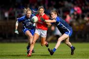 16 June 2019; Orla Finn of Cork in action against Emma Murray, right, and  Máiréad Wall of Waterford during the TG4 Ladies Football Munster Senior Football Championship Final match between Cork and Waterford at Fraher Field in Dungarvan, Co. Waterford. Photo by Harry Murphy/Sportsfile