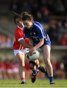 16 June 2019; Karen McGrath of Waterford in action against Ciara O'Sullivan of Cork during the TG4 Ladies Football Munster Senior Football Championship Final match between Cork and Waterford at Fraher Field in Dungarvan, Co. Waterford. Photo by Harry Murphy/Sportsfile