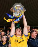 16 June 2019; Hubert Darcy of Roscommon lifts the trophy following his side's victory during the Connacht GAA Football Senior Championship Final match between Galway and Roscommon at Pearse Stadium in Galway. Photo by Seb Daly/Sportsfile