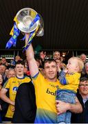 16 June 2019; Cathal Cregg of Roscommon lifts the trophy following his side's victory during the Connacht GAA Football Senior Championship Final match between Galway and Roscommon at Pearse Stadium in Galway. Photo by Seb Daly/Sportsfile