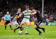 14 June 2019; Ronan Finn of Shamrock Rovers in action against Aaron Barry of Bohemians during the SSE Airtricity League Premier Division match between Bohemians and Shamrock Rovers at Dalymount Park in Dublin. Photo by Seb Daly/Sportsfile