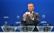 18 June 2019; UEFA Head of Club Competitions Michael Heselschwerdt draws out the name of Dundalk FC during the UEFA Champions League first qualifying round draw at the UEFA headquarters, The House of European Football in Nyon, Switzerland. Photo by UEFA via Sportsfile