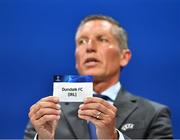 18 June 2019; UEFA Head of Club Competitions Michael Heselschwerdt draws out the name of Dundalk FC during the UEFA Champions League first qualifying round draw at the UEFA headquarters, The House of European Football in Nyon, Switzerland. Photo by UEFA via Sportsfile