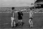 3 July 1983; Referee Jody Gunning performs the coin toss between captains Joe Cassells of Meath and Tommy Drumm of Dublin prior to the game. Leinster Senior Football Championship quarter-final replay, Meath v Dublin in Croke Park in Dublin. Photo by Ray McManus/Sportsfile.