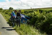 21 June 2019; Ken Block, left, and co-driver Alex Gelsomino inspect their Escort Cosworth which crashed on SS 2 Grianan  during Day 1 of the 2019 Joule Donegal International Rally in Letterkenny, Donegal. Photo by Philip Fitzpatrick/Sportsfile