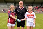 22 June 2019; Galway captain Brenda Naughton, left, and Cork captain Millie Condon with referee Jonathon Murphy prior to the Ladies Football All-Ireland U14 Platinum Final 2019 match between Cork and Galway at St Rynaghs in Banagher, Offaly. Photo by Ben McShane/Sportsfile
