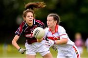22 June 2019; Ella Downey of Cork in action against Molly Boote of Galway during the Ladies Football All-Ireland U14 Platinum Final 2019 match between Cork and Galway at St Rynaghs in Banagher, Offaly. Photo by Ben McShane/Sportsfile