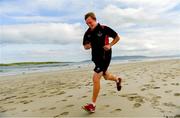 22 June 2019; Parkrun Ireland in partnership with Vhi, added a new parkrun at Narin Beach on Saturday 22nd June, with the introduction of the Narin parkrun on Narin Beach in Portnoo, Donegal. Parkruns take place over a 5km course weekly, are free to enter and are open to all ages and abilities, providing a fun and safe environment to enjoy exercise. To register for a parkrun near you visit www.parkrun.ie. Pictured is John Harrison during the parkrun. Photo by Ramsey Cardy/Sportsfile