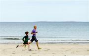 22 June 2019; Parkrun Ireland in partnership with Vhi, added a new parkrun at Narin Beach on Saturday 22nd June, with the introduction of the Narin parkrun on Narin Beach in Portnoo, Donegal. Parkruns take place over a 5km course weekly, are free to enter and are open to all ages and abilities, providing a fun and safe environment to enjoy exercise. To register for a parkrun near you visit www.parkrun.ie. Pictured is participants during the parkrun. Photo by Ramsey Cardy/Sportsfile