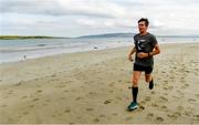 22 June 2019; Parkrun Ireland in partnership with Vhi, added a new parkrun at Narin Beach on Saturday 22nd June, with the introduction of the Narin parkrun on Narin Beach in Portnoo, Donegal. Parkruns take place over a 5km course weekly, are free to enter and are open to all ages and abilities, providing a fun and safe environment to enjoy exercise. To register for a parkrun near you visit www.parkrun.ie. Pictured is a participant during the parkrun. Photo by Ramsey Cardy/Sportsfile