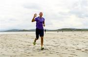 22 June 2019; Parkrun Ireland in partnership with Vhi, added a new parkrun at Narin Beach on Saturday 22nd June, with the introduction of the Narin parkrun on Narin Beach in Portnoo, Donegal. Parkruns take place over a 5km course weekly, are free to enter and are open to all ages and abilities, providing a fun and safe environment to enjoy exercise. To register for a parkrun near you visit www.parkrun.ie. Pictured is a participant during the parkrun. Photo by Ramsey Cardy/Sportsfile