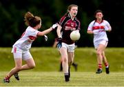 22 June 2019; Ciara Coen of Galway in action against Lily Murray of Cork during the Ladies Football All-Ireland U14 Platinum Final 2019 match between Cork and Galway at St Rynaghs in Banagher, Offaly. Photo by Ben McShane/Sportsfile