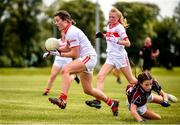 22 June 2019; Eabha Brennan of Galway goes to ground after a tackle from Lia Heffernan, left, and Katie O'Driscoll of Cork during the Ladies Football All-Ireland U14 Platinum Final 2019 match between Cork and Galway at St Rynaghs in Banagher, Offaly. Photo by Ben McShane/Sportsfile