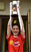 22 June 2019; The Tyrone captain Poppy Fox lifts the cup after the Ladies Football All-Ireland U14 Gold Final 2019 match between Monaghan and Tyrone at St Aidan's GAA Club in Templeport, Cavan. Photo by Ray McManus/Sportsfile