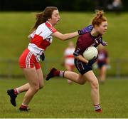 22 June 2019; Emer Fogarty of Westmeath in action against Sarah Heron of Derry during the Ladies Football All-Ireland U14 Bronze Final 2019 match between Derry and Westmeath at St Aidan's GAA Club in Templeport, Cavan. Photo by Ray McManus/Sportsfile