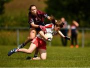 22 June 2019; Eabha Mullan of Derry in action against Aine Ditullio of Westmeath during the Ladies Football All-Ireland U14 Bronze Final 2019 match between Derry and Westmeath at St Aidan's GAA Club in Templeport, Cavan. Photo by Ray McManus/Sportsfile