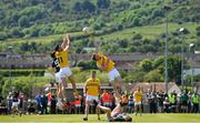 22 June 2019; Cian O'Donoghue of Kildare in action against Matthew Fitzpatrick, left, and Stephen Beatty of Antrim during the GAA Football All-Ireland Senior Championship Round 2 match between Antrim and Kildare at Corrigan Park in Belfast, Antrim. Photo by Ramsey Cardy/Sportsfile