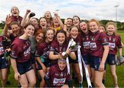22 June 2019; Westmeath captain Kelly Burke and her team-mates celebrate with the cup during the Ladies Football All-Ireland U14 Bronze Final 2019 match between Derry and Westmeath at St Aidan's GAA Club in Templeport, Cavan. Photo by Ray McManus/Sportsfile