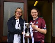 22 June 2019; Kelly Burke of Westmeath is presented with the cup by Eileen Jones, Ulster President, after the Ladies Football All-Ireland U14 Bronze Final 2019 match between Derry and Westmeath at St Aidan's GAA Club in Templeport, Cavan. Photo by Ray McManus/Sportsfile