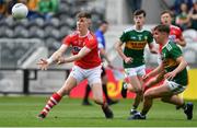 22 June 2019; Connor Corbett of Cork in action against Kieran O'Sullivan of Kerry during the Electric Ireland Munster GAA Football Minor Championship Final match between Cork and Kerry at Páirc Ui Chaoimh in Cork.  Photo by Brendan Moran/Sportsfile