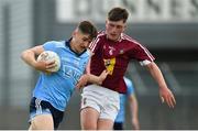 22 June 2019; Luke Swan of Dublin in action against Conor Gibney of Westmeath during the Electric Ireland Leinster GAA Football Minor Championship semi-final match between Westmeath and Dublin at TEG Cusack Park in Mullingar, Co. Westmeath. Photo by Diarmuid Greene/Sportsfile
