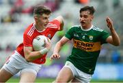 22 June 2019; Connor Corbett of Cork in action against Kieran O'Sullivan of Kerry during the Electric Ireland Munster GAA Football Minor Championship Final match between Cork and Kerry at Páirc Ui Chaoimh in Cork.  Photo by Brendan Moran/Sportsfile