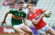 22 June 2019; Ryan O’Donovan of Cork in action against Ronan Collins of Kerry during the Electric Ireland Munster GAA Football Minor Championship Final match between Cork and Kerry at Páirc Ui Chaoimh in Cork.  Photo by Brendan Moran/Sportsfile