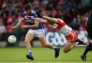 22 June 2019; Daniel O'Reilly of Laois in action against Chrissy McKaigue of Derry during the GAA Football All-Ireland Senior Championship Round 2 match between Derry and Laois at Derry GAA Centre of Excellence in Owenbeg, Derry. Photo by Ramsey Cardy/Sportsfile