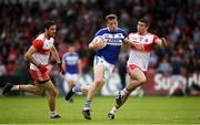 22 June 2019; Kieran Lillis of Laois in action against Ciaran McFaul of Derry during the GAA Football All-Ireland Senior Championship Round 2 match between Derry and Laois at Derry GAA Centre of Excellence in Owenbeg, Derry. Photo by Ramsey Cardy/Sportsfile